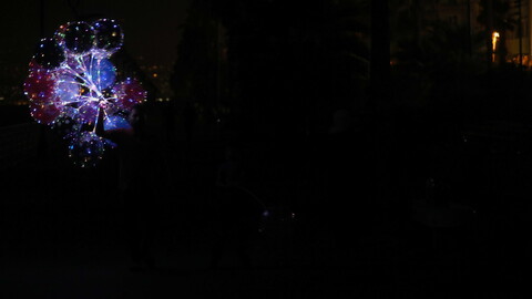 Beirut in darkness; glow-in-the-dark balloons. Beirut, Lebanon. August 28, 2020. (Marwan Tahtah/The Public Source)