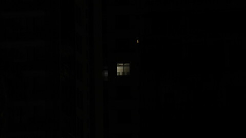 Beirut in darkness; a lit up window. Beirut, Lebanon. August 28, 2020. (Marwan Tahtah/The Public Source)