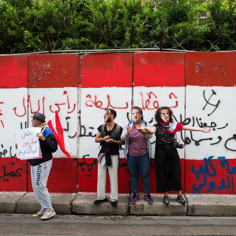Demonstrators don central bank Governor Riad Salameh masks at a rally demanding a "haircut" for large depositors. Beirut, Lebanon. November 27, 2019. (Rita Kabalan/The Public Source)