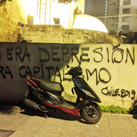 Inspired by a banner carried by protesters Chile, "it's not depression, it's capitalism” reads this wall in Beirut, Lebanon. December 4, 2019. (Lara Bitar/The Public Source)