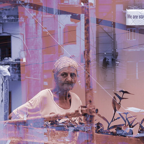 Composite of an elderly resident of  Mar Mikhael standing on her balcony, construction workers, and a sign that reads, "We are Staying." Beirut, Lebanon. Photos taken between August and October 2020 by Marwan Tahtah. (The Public Source)