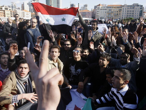 Syrian regime supporters disrupt the one-year commemoration of the Syrian uprising in Martyrs’ Square. Beirut, Lebanon. March 17, 2012. (Marwan Tahtah/The Public Source)