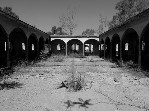 A black and white image showing the courtyard of Webster House built in 1937 at Asfuriyyeh hospital in Hazmieh, Lebanon.