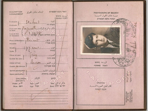 Open passport showing personal details and a black-and-white photo of the bearer, with stamps and handwritten entries in Arabic, Hebrew, and English.