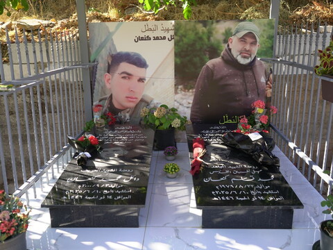 The caskets of Mohammad Kanaan and his son Wael Kanaan lie in Chebaa’s cemetery.