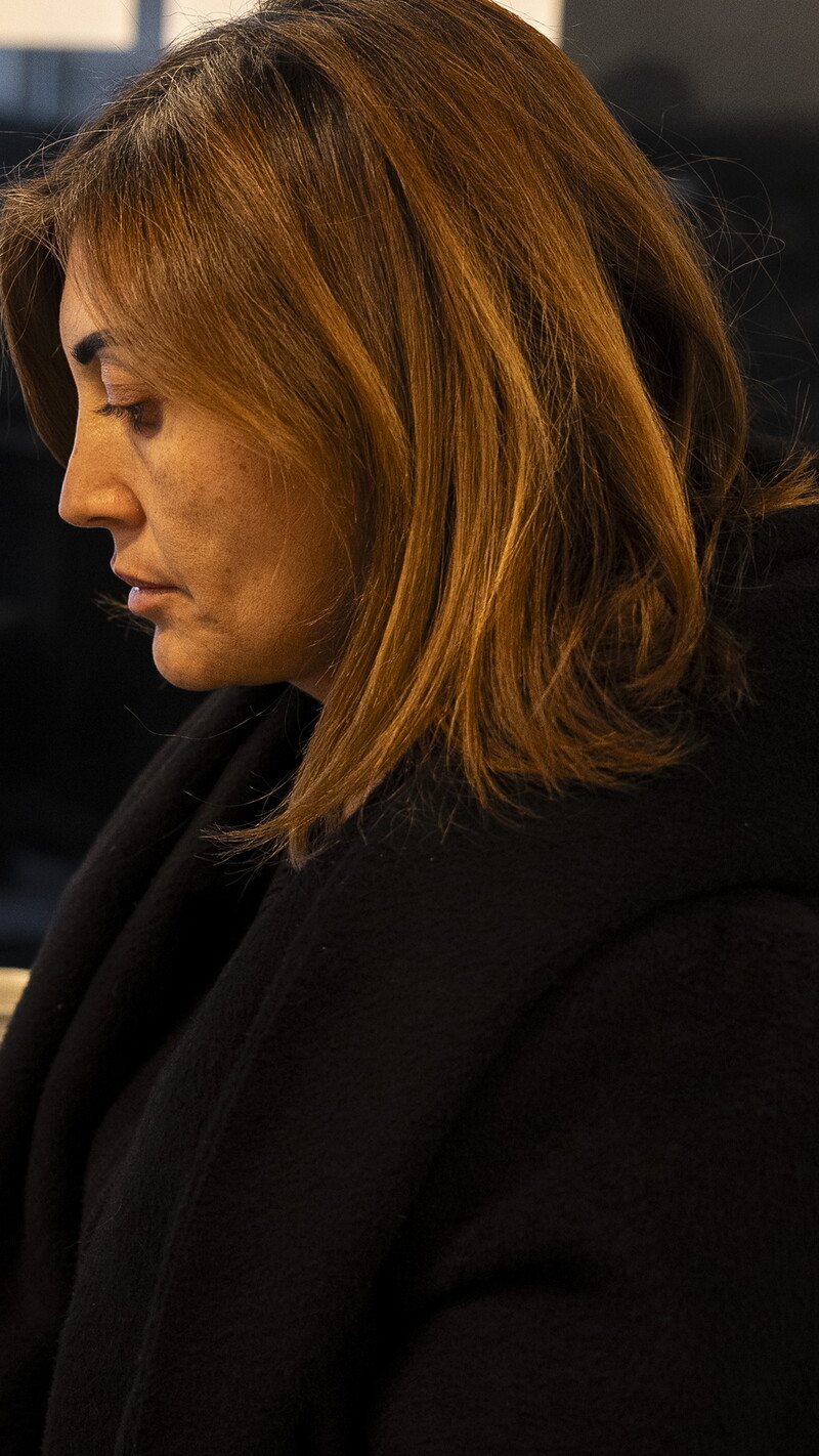 Amal Khalil at her desk in the Al-Akhbar office, editing an upcoming episode of her newly launched program, Ahel al-Ared (The People of the Land).
