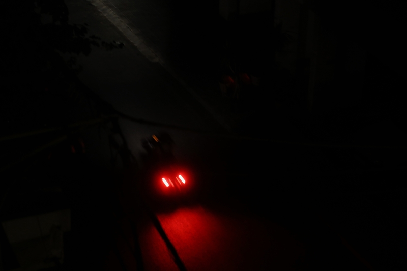 Beirut in darkness; a car's tail lights light up the street. Beirut, Lebanon. August 28, 2020. (Marwan Tahtah/The Public Source)