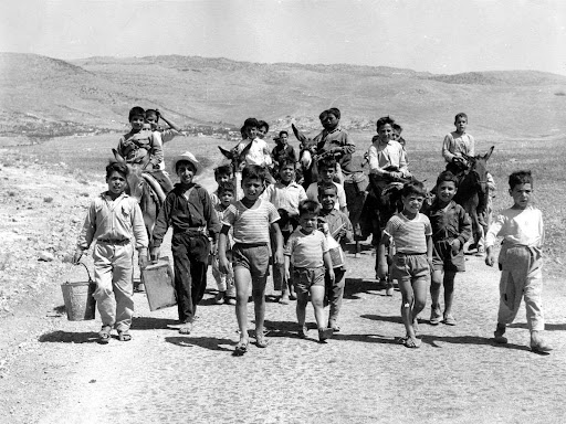 Children in Akkar on their way to fill up water from a well, July 1967. 