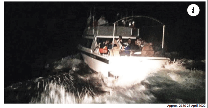 The report by AusRelief Sons of Lebanon Submarine Mission shows an image of the migrant boat taken during the boat chase at around 9:30 p.m.
