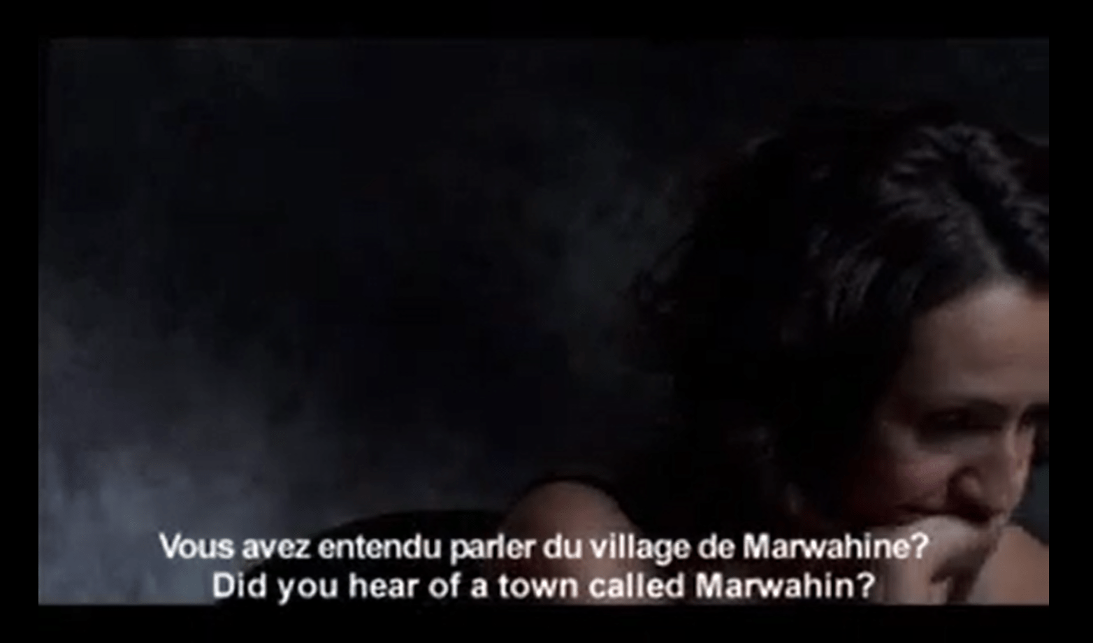 A screenshot from a film; the subtitles read: "Did you hear of a town called Marwahin?"