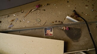 A photo of a child is left in the rubble of Beirut's destroyed St.Georges Hospital.