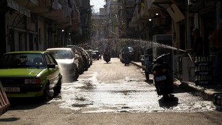 Over several blocks around “Rony Cell,” workers have turned empty stores into repair shops, mainly for household appliances like fridges, washing machines, and gas stoves. Many have lost their jobs in construction and home improvement work due to the economic crisis and the pandemic. Nabaa, Lebanon. June 26, 2021. (Mohamad Cheblak/The Public Source)