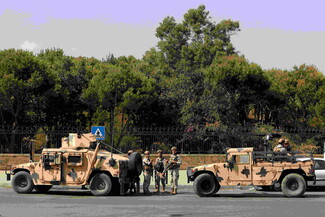 In a statement published online, the army announced that it will open fire “at anyone who is armed on the street and at anyone who fires from anywhere else,” and asked civilians to vacate the streets. Tayouneh Roundabout, Beirut. October 14, 2021. (Marwan Tahtah/The Public Source)