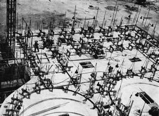 View from above of bracing beams with four hydraulic jacks occupying the place of the engine room columns