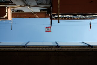 A building balcony overlooks the highway in Bourj Hammouud