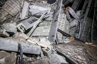 The rubble of a destroyed building.