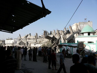 A photo of an attack on the Al Omari mosque in 2014.