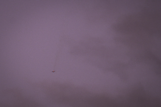 A drone falling from the sky after being targeted.