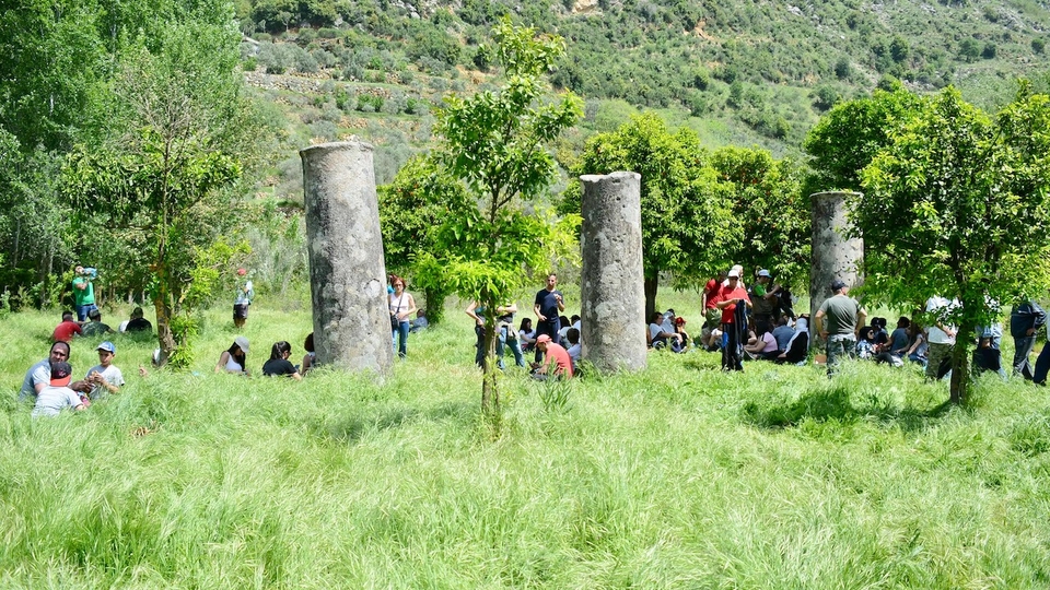 Visitors gather by the ruins of the Ancient Roman Marj Bisri temple during a hike aimed at promoting awareness of the site's cultural and historical heritage. April 22, 2017. (Photo courtesy of "Save the Bisri Valley Campaign")