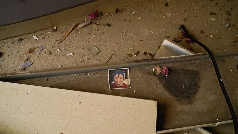 A photo of a child is left in the rubble of Beirut's destroyed St.Georges Hospital.