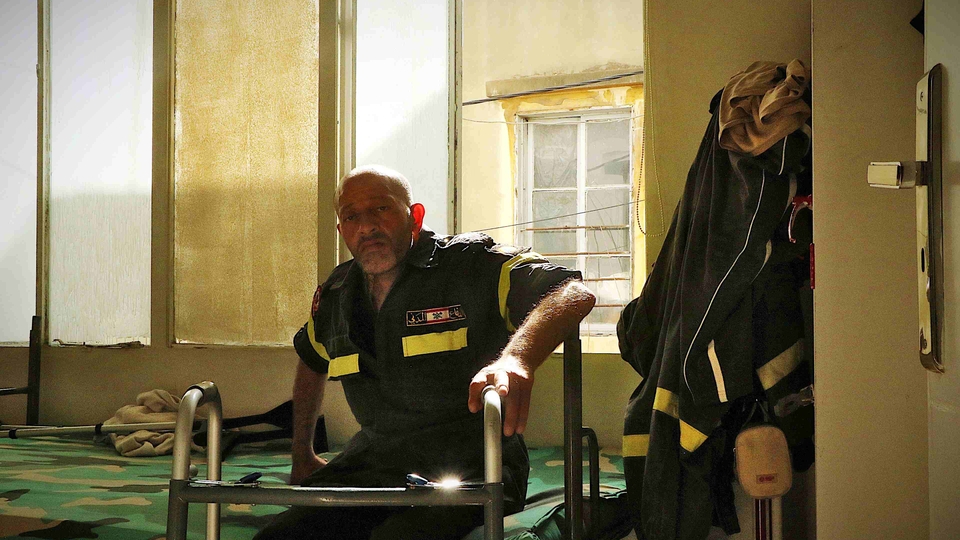Abdel Rahman “Abed” Shebnaty in uniform at the Bachoura Civil Defense Station, where he has been a volunteer since the July 2006 war. Bachoura, Beirut. April 29, 2021. (Rola Khayyat/The Public Source)