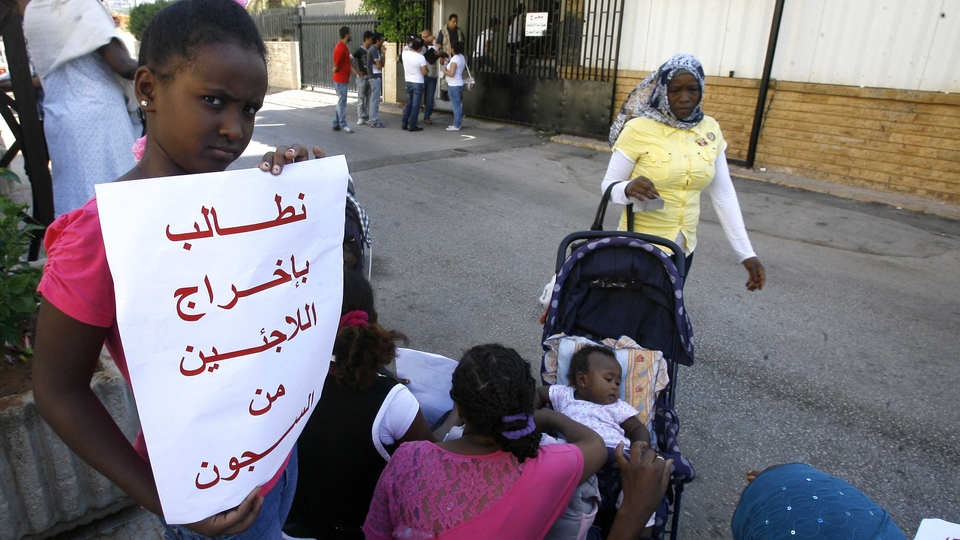 Families of detained Sudanese refugees gather outside UNHCR headquarters in Beirut to demand the release of their loved ones from prison, arrested during a preceding protest to demand refugee rights. August 2012. (Marwan Tahtah/The Public Source)