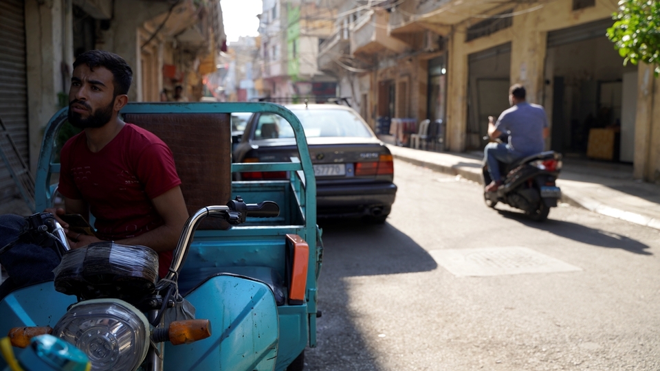 A tuk tuk driver works with the repair shops to transport appliances back and forth to customers’ homes. Nabaa, Lebanon. June 26, 2021. (Mohamad Cheblak/The Public Source)